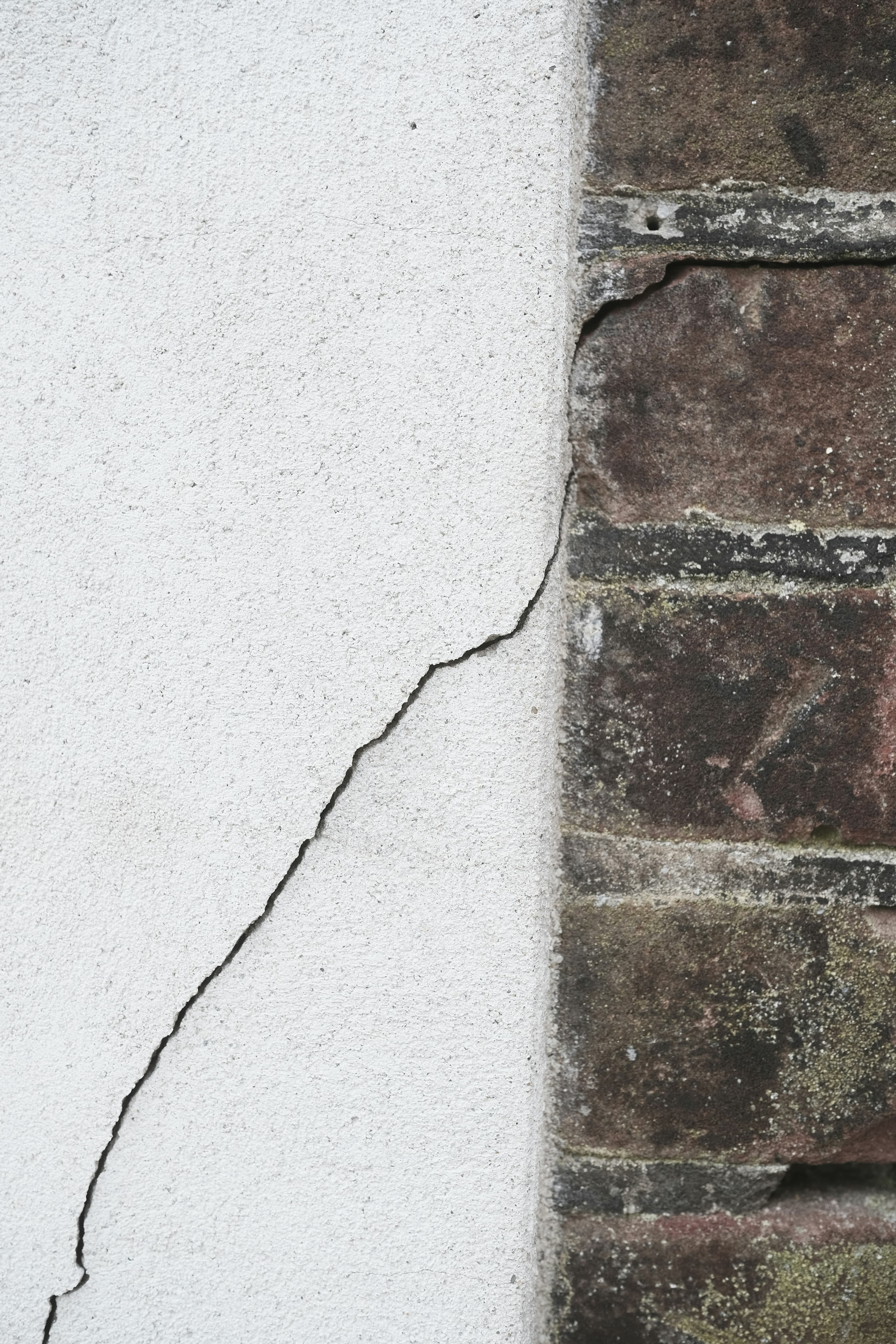 Visible cracking and foundation movement before assessment.